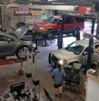Shop floor with vehicles being repaired
